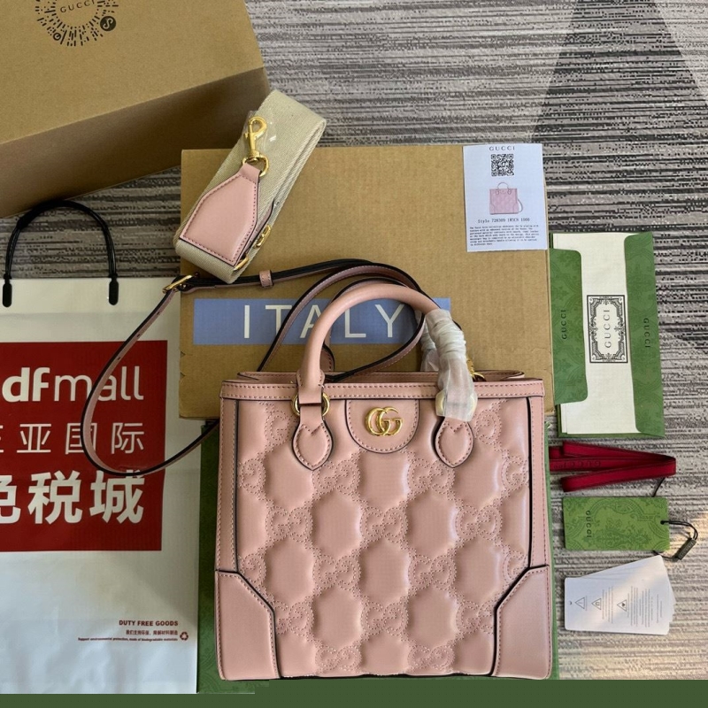 G*u*i top handle bags